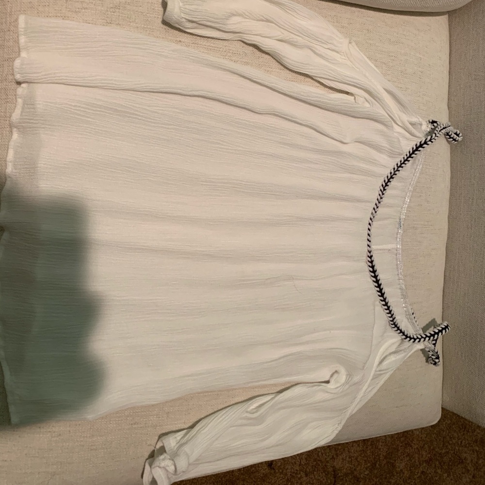 Francesca’s white shoulder top